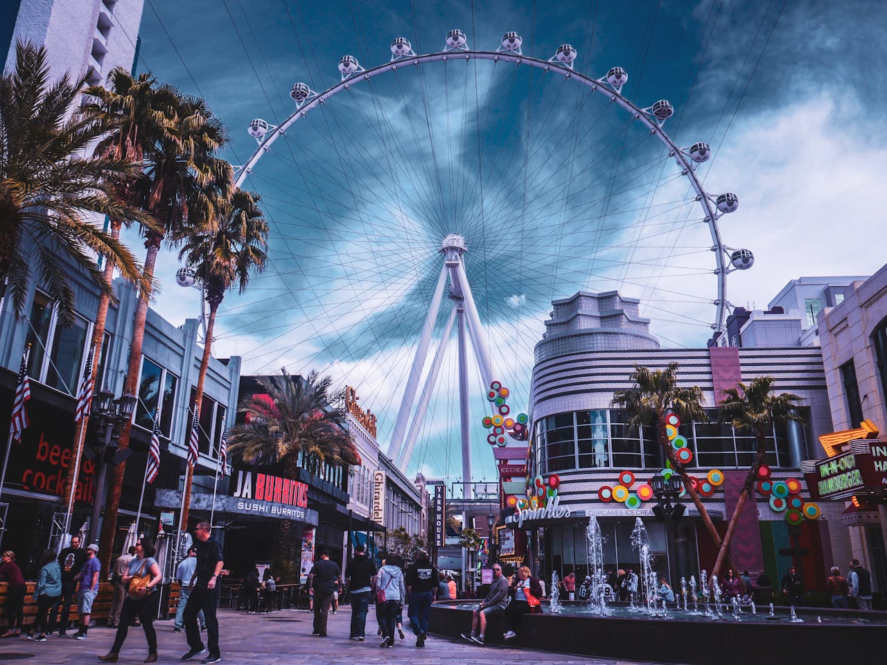 Vibrant urban scene with High Roller Ferris Wheel in Las Vegas, Nevada.